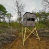 Elevated Hunter's View Hunting Blind in Forested Area