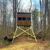 Elevated Wooden Hunting Blind in a Forested Area