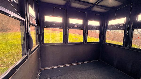 Inside View of Spacious Hunting Blind with Multiple Windows