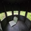 Interior of a Surround View Hunting Blind with a single chair